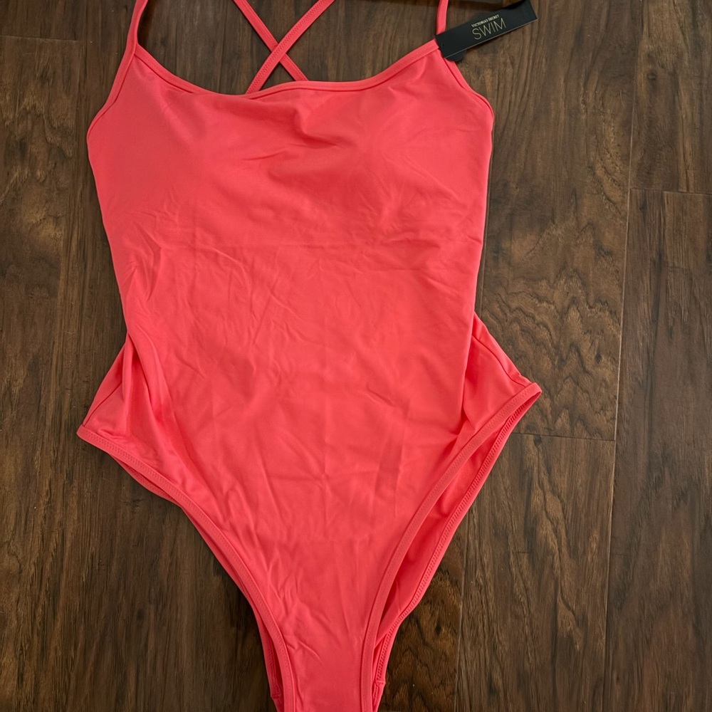 Victoria's Secret "pink island" one piece swimsuit. Size large.